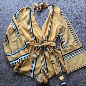 70s vibe plugging neck line romper